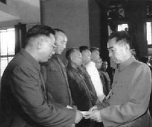 1955年9月，国务院总理周恩来向许光达（左一）等颁发授予大将军衔的命令状